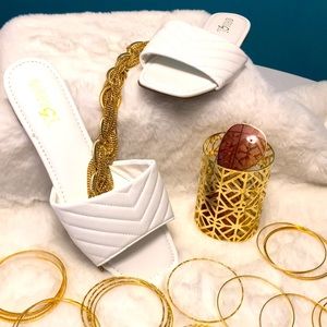 Brand new white leather slides, quilted design.